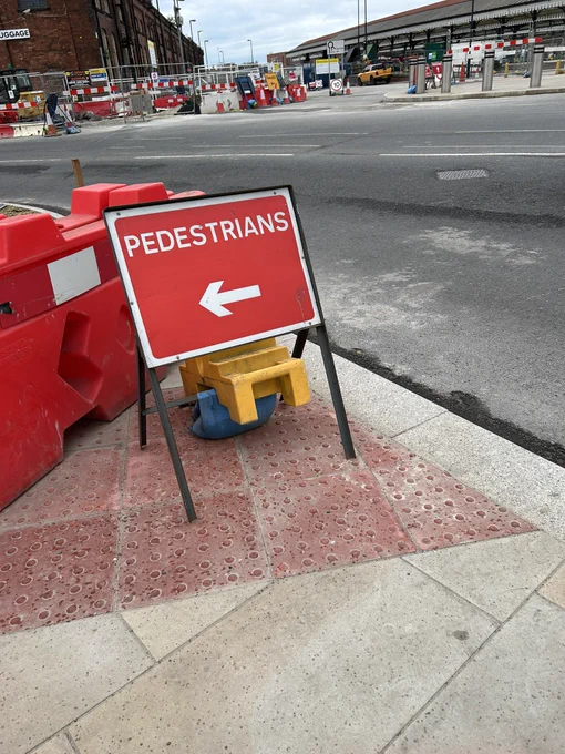 Tactile paving up to the carriageway at the other end of the scheme.