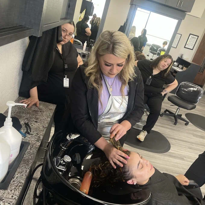 students watching hair toning in wash bowl