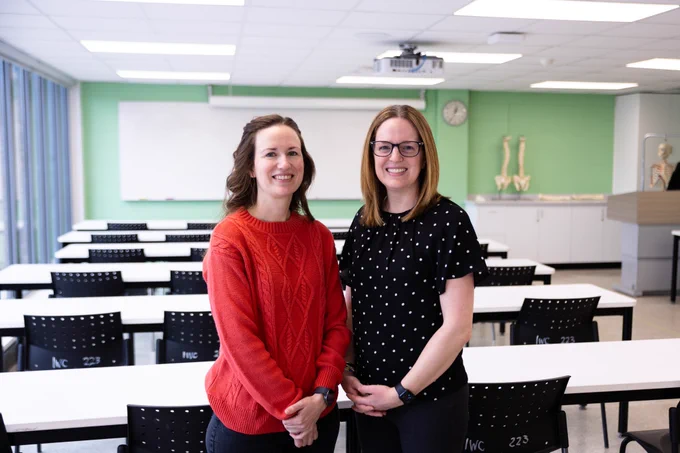 Stephanie Sanger, left, education and curriculum planning librarian, and Anastasia Newman, assistant professor, in a classroom at McMaster University. Photo by Brad Leenstra/McMaster University Libraries.