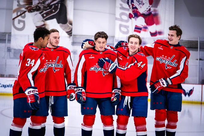 Justin Sourdif, Ivan Miroshnichenko, Ryan Leonard, Cole Hutson and Ilya Protas all gather together for a group photo. 
