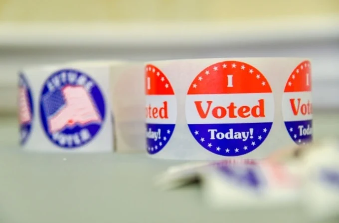 A roll of stickers reading "I voted today!"