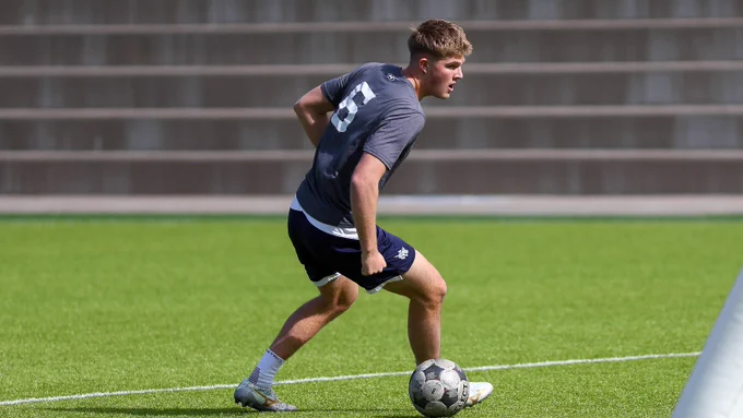 Hudson Waddell maneuvers with the ball in early work 