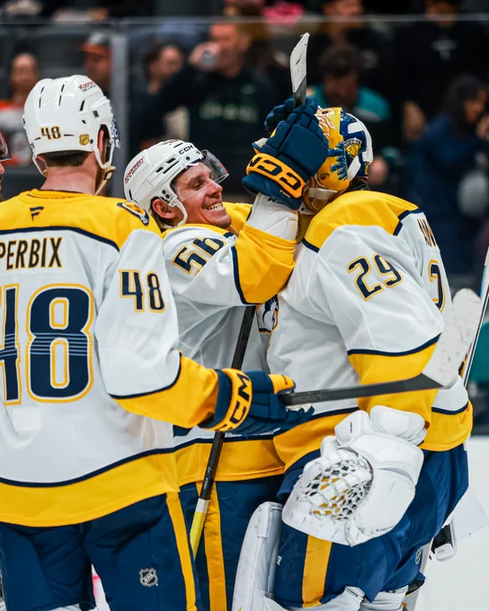 Image of the Preds and Haula congratulating Annunen on his shutout tonight 