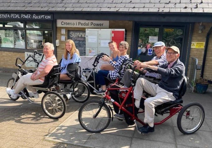 Photo of 3 generations on Pedal Power side by side cycles