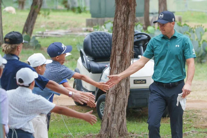Golfer Jordan Spieth with fans at the Valero Texas Open. Photo courtesy of Valero Texas Open.
