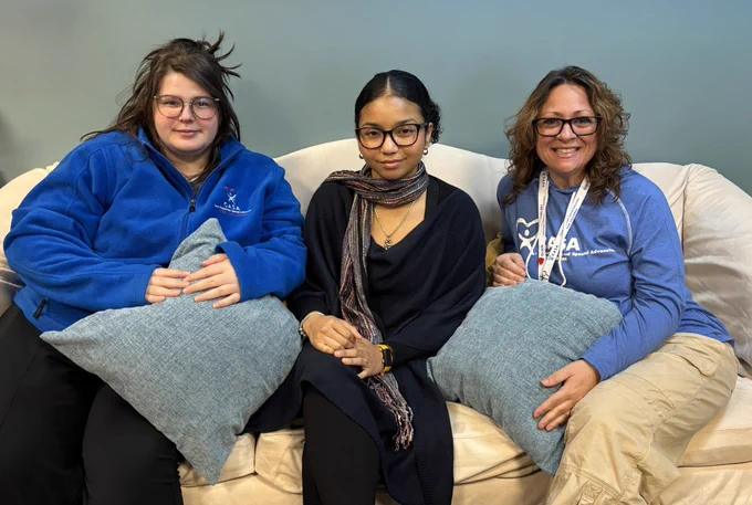 Image of CASA of Franklin County Staff members wearing various shades of blue in support of Child Abuse Prevention Month.