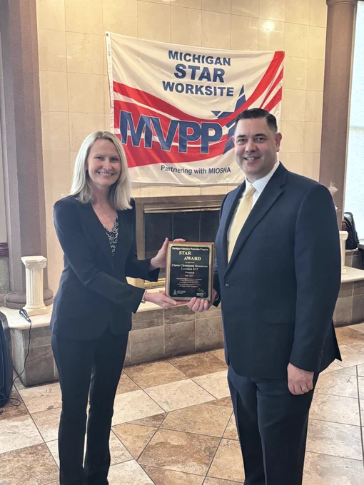 MIOSHA’s Kristin Osterkamp presents the MVPP Star Award to leaders and employees at Cintas Corporation’s K15 facility in Westland.
