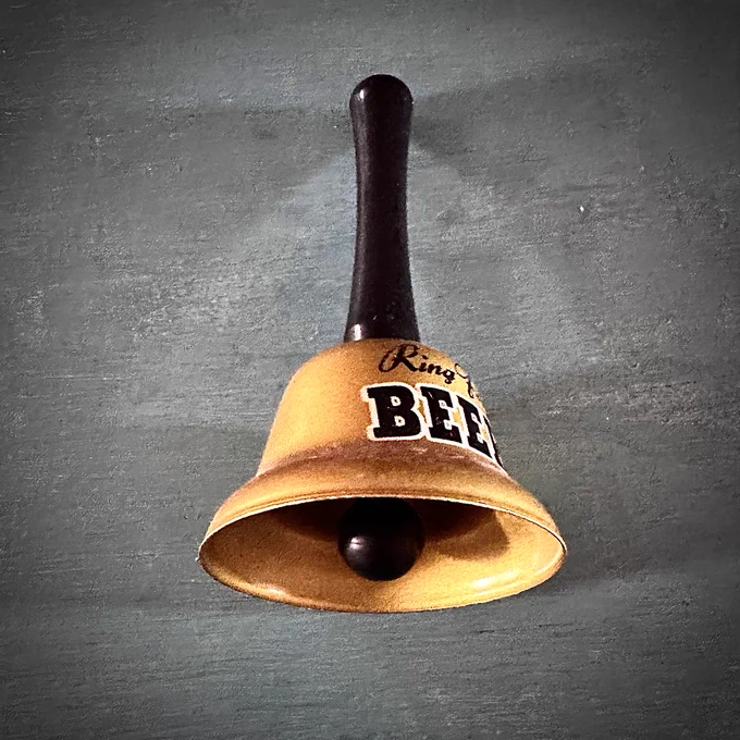 Spurtle handbell used to signal speaker's time is up.