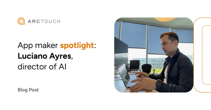 ArcTouch branded template with a white background and orange design elements. On the right, a photograph of Luciano Ayres working on his computer. On the left side, the ArcTouch logo is visible at the top. Below, the text reads "App maker spotlight: Luciano Ayres, director of AI," with "spotlight" stylized in orange. At the bottom left, the text reads "Blog Post."