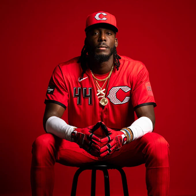 Elly De La Cruz sitting down for a photo. He’s wearing the new Reds City Connect uniform.