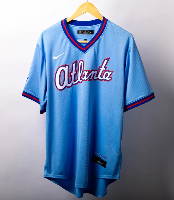 A blue Atlanta Braves City Connect jersey with white and red lettering.