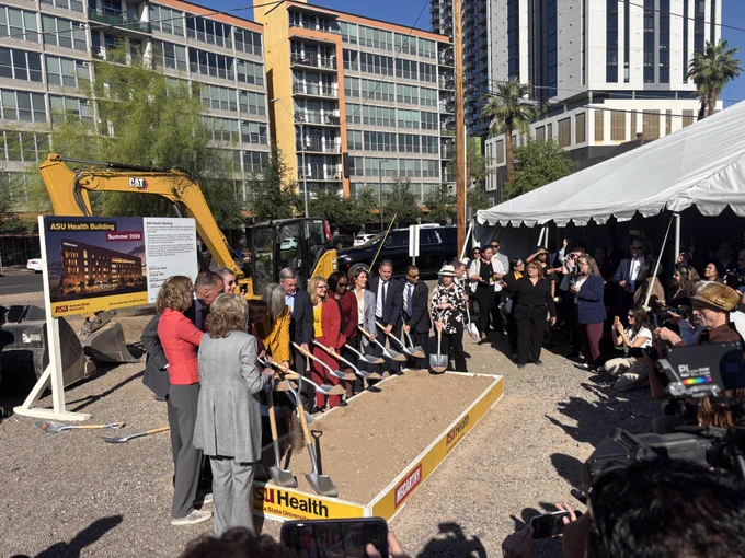 Officials and partners break ground at ASU Health headquarters construction site.