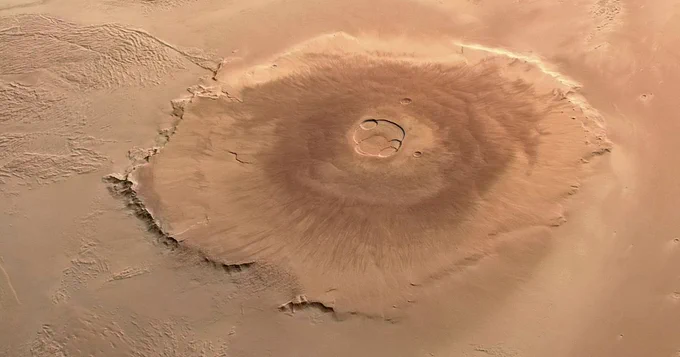 Olympus Mons – Orbital view of the solar system’s tallest volcano.