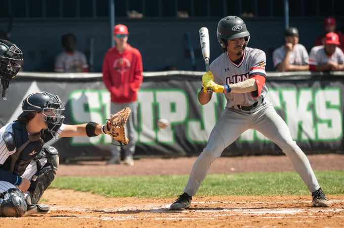 Catcher catching the pitch that the opponent didn’t swing at