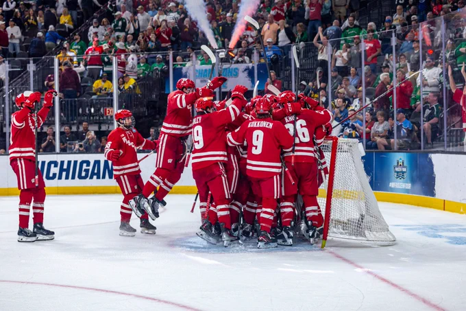 Adam Pietila jumping into the celebration