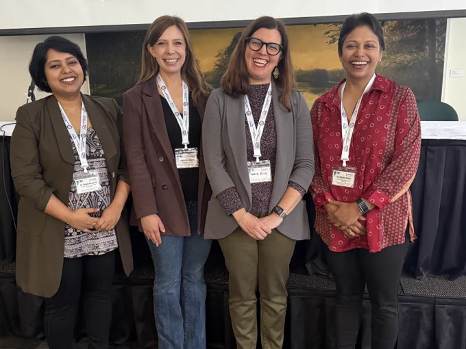 Pallabi Bhowmick, Elena Remillard, Laura Rice, and Raksha Mudar stand together smiling at #ISG2026 after their talk on caregiving and technology design for older adults