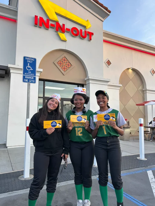 Three newly admitted UC Berkeley students pose for a photo in front of In-N-Out.