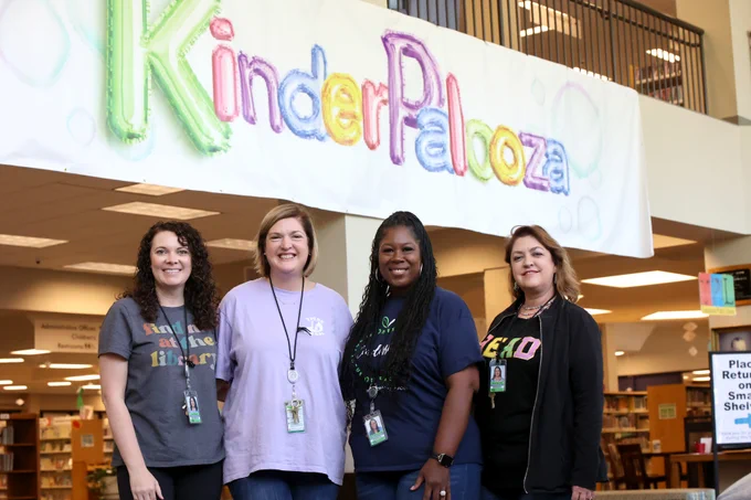 Tuscaloosa City School literacy team at the library setting up for Kinderpalooza