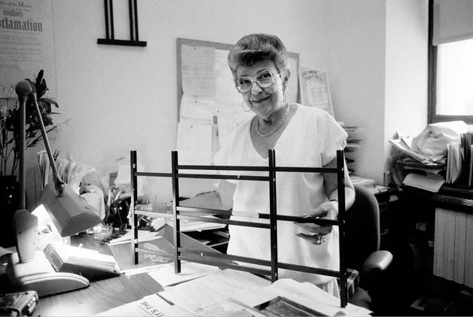 Photo of Charlotte Spiegel, director of the health department's Window Falls Prevention Program, holding up a City-approved window guard.

Photo courtesy of Jim Wilson, the New York Times.