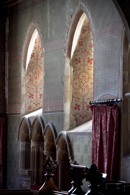 Windows at Preston Park decorated with red and green stencilling (c) Natalie Miller