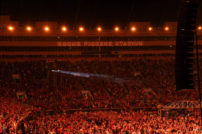 Boone Pickens Stadium at night during a sold-out concert.