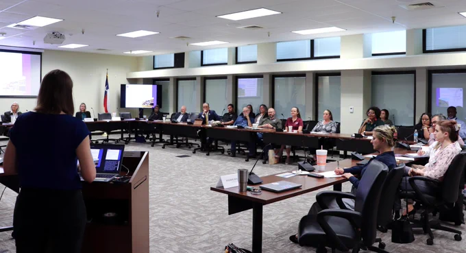 Suzanne Barnard with the Texas Department of Agriculture speaks to a room of local officials about the Texas Community Development Block Grant programs that TDA oversees.