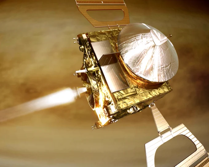 Artist's impression of Venus Express orbit insertion. Venus fills the background and we cannot see the entire planet. The spacecraft is seen burning its engines.