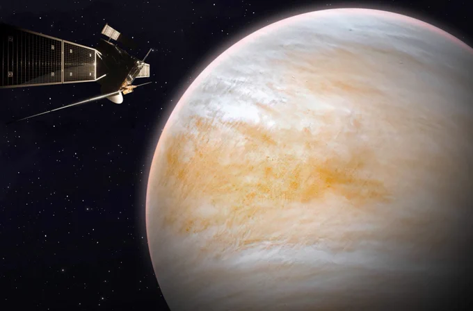 Artist impression of Envision at Venus. Almost the entire planet is visible on the right side. On the left, we see the spacecraft from the side, with its solar arrays stretched.