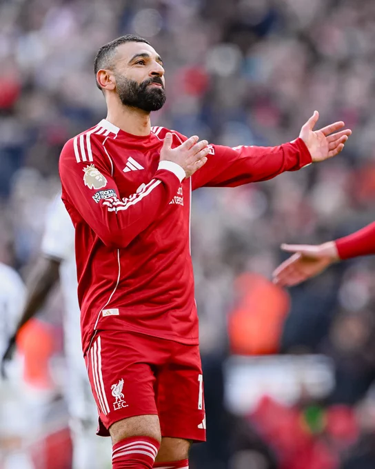 Photography of Mo Salah celebrating his goal against Fulham.