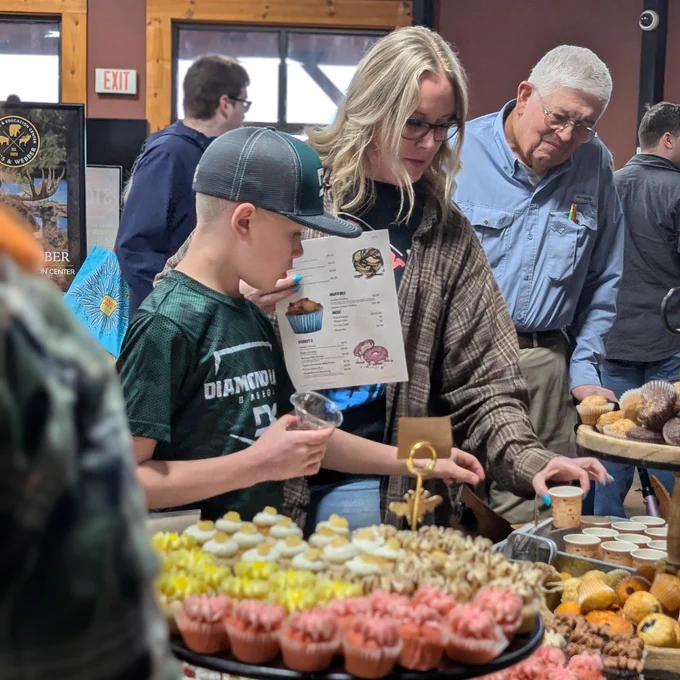 Generations of attendees enjoy refreshments from local restaurants at A Northern Tradition hosted at Jay's Sporting Goods.