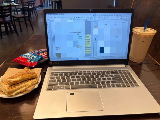 Laptop at cafe.