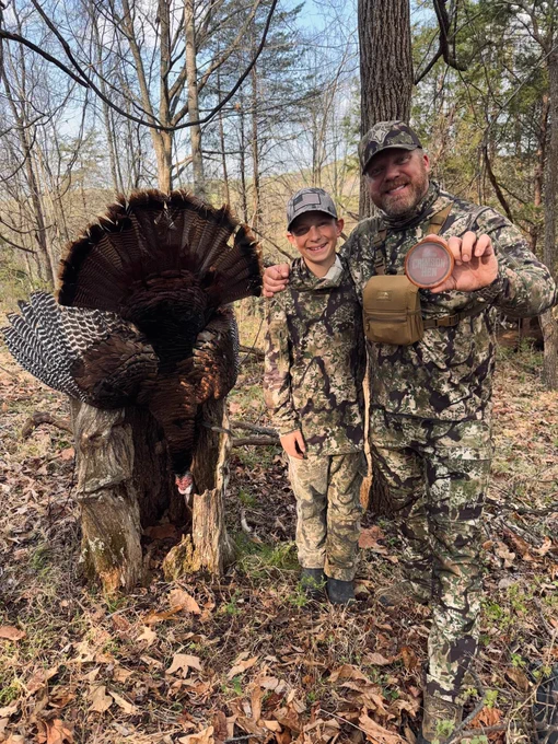 Two hunters and a turkey.