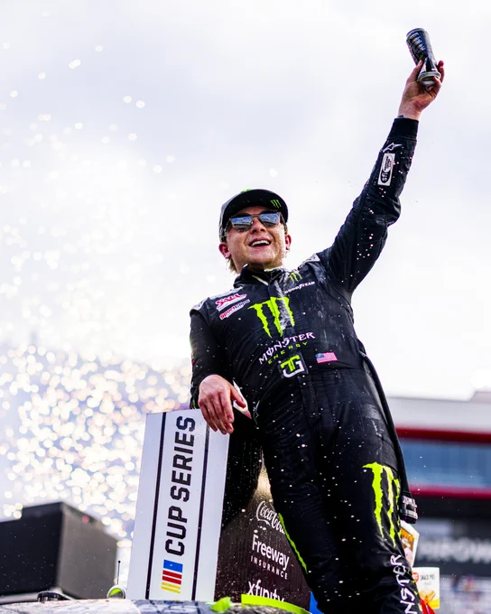 A photo of Ty Gibbs celebrating his first career NASCAR Cup Series win at Bristol Motor Speedway. 