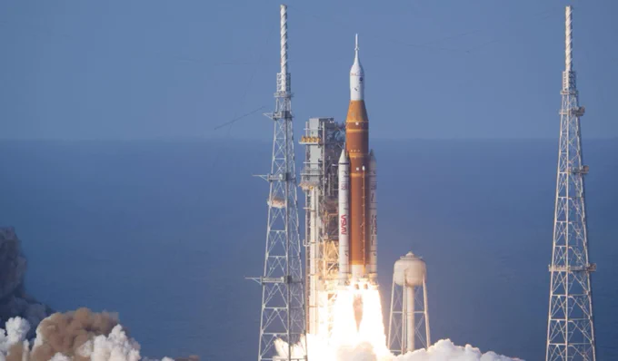 Image showing the Artemis II rocket lifting off from Kennedy Space Center. The Artemis II launch provided USF’s largest dataset on seismic and infrasound activity from a rocket launch. (Photo courtesy of NASA/Bill Ingalls)