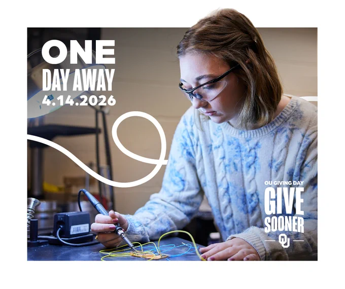 A person wearing glasses is soldering wires on a circuit board in a workshop. The image features text: "One Day Away 4.14.2026" and "OU Giving Day Give Sooner" with the University of Oklahoma logo.