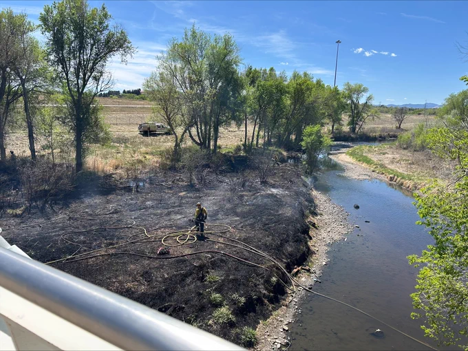 Firefighters work on mop-up operations, ensuring a vegetation fire is fully out. The fire took placed on Monday, April 13 in Gold Strike Park near Arvada.