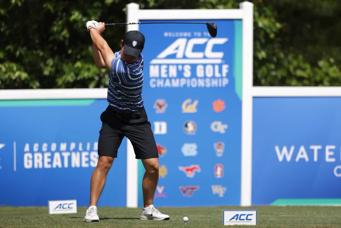 Bryan Kim swinging golf club. 