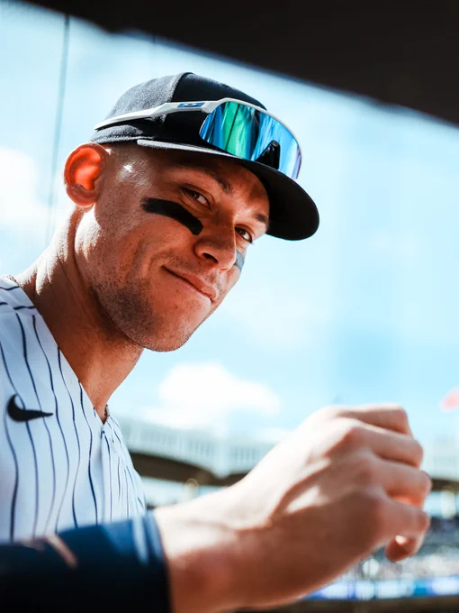 Aaron Judge smiles as he takes the field at Yankee Stadium. 