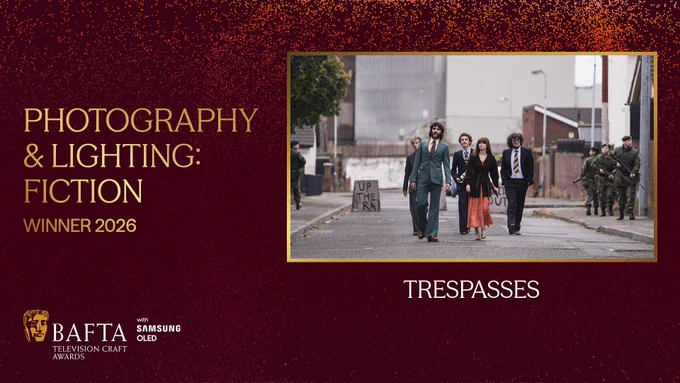 Designed graphic with a dark red background and lighter peach and orange coloured particle detailing. To the left of the graphic there is gold text which reads ‘Photography & Lighting: Fiction Winner 2026’. The BAFTA TV Craft Awards logo with Samsung OLED lock up sits on the bottom left of the graphic and on the right-hand side there is a gold framed box with an image from ‘Trespasses’ within the frame. Beneath the box it reads ‘Trespasses’ in white text.