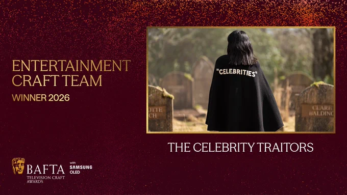 Designed graphic with a dark red background and lighter peach and orange coloured particle detailing. To the left of the graphic there is gold text which reads ‘Entertainment Craft Team Winner 2026’. The BAFTA TV Craft Awards logo with Samsung OLED lock up sits on the bottom left of the graphic and on the right-hand side there is a gold framed box with an image from ‘The Celebrity Traitors’ within the frame. Beneath the box it reads ‘The Celebrity Traitors’ in white text.