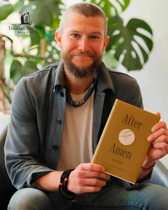 A smiling man holds a book title "After Amen 50 Days of Poetry and Prayer by Tyler Staton" while sitting in a chair with a plant behind him. The publisher Thomas Nelson logo is also displayed. 