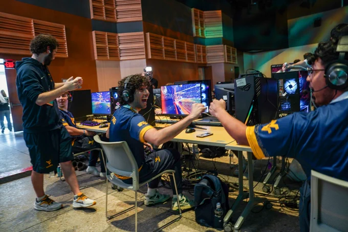 WVU Rocket League players celebrate a goal.