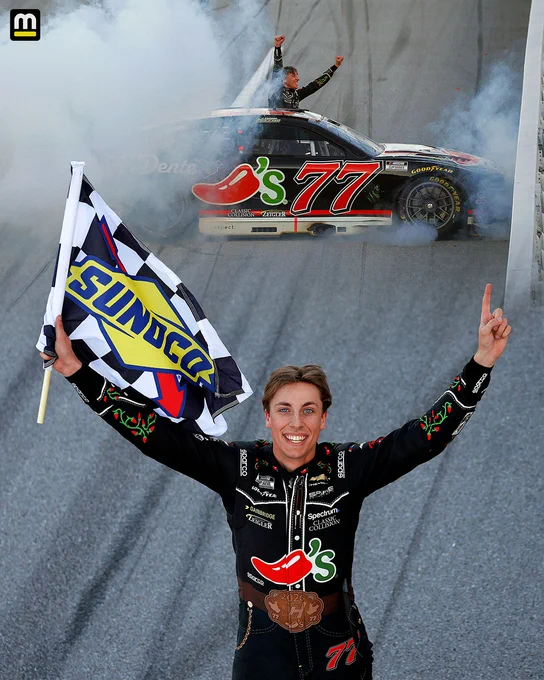 Carson Hocevar celebrates winning at Talladega, his first NASCAR Cup Series victory. 