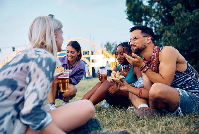 Photograph of a friend group at a festival.