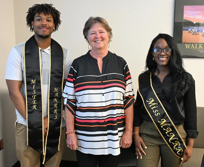 Dr. Barb Glenn, center, meets with Mr. and Miss MANRRS at UMES.