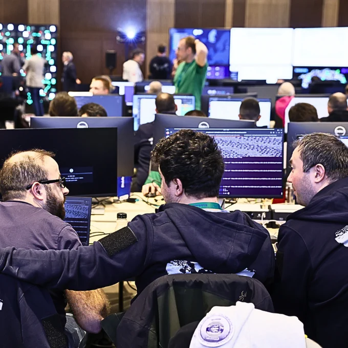 Cybersecurity experts working at computers during the Locked Shields 2026 cyber defence exercise. Photo by NATO Cooperative Cyber Defence Centre of Excellence