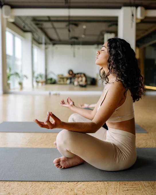 Woman meditating by herself.