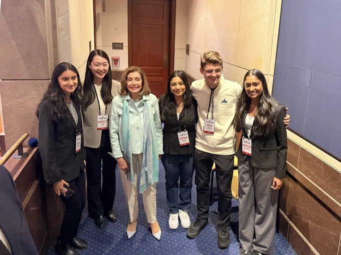 Natalie Lao with Nancy Pelosi and Congressional App Challenge staff.
