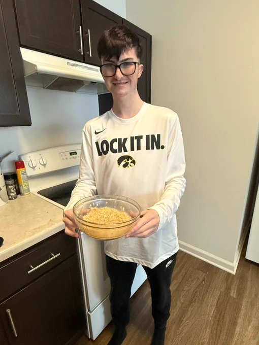 Dru holds a bowl of oatmeal.