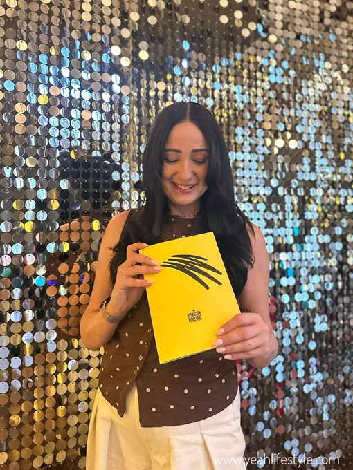 Blogger holding Operation Mincemeat Booklet